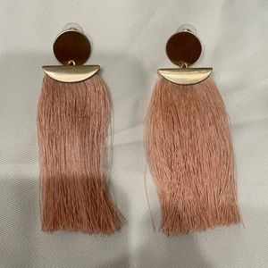 Gold statement earrings w/ peach accent.